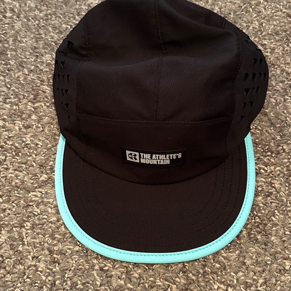 NWT Brand new Copper Mountain The Athletes Mountain Black Cap with Aqua Trim.